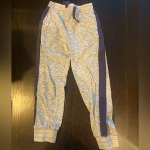Like new Size 7 gray Boutique jogger/ sweat pant w navy stripe design.